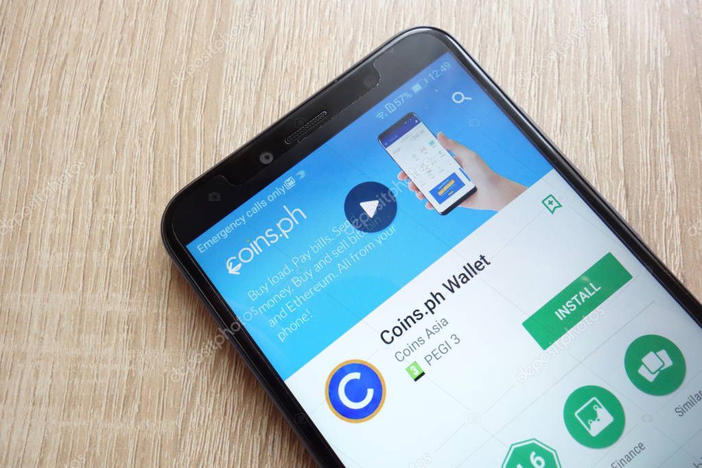 KONSKIE, POLAND - JUNE 17, 2018: Coins.ph Wallet app on Google Play Store website displayed on Huawei Y6 2018 smartphone