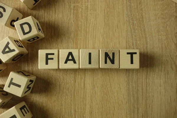 Faint Word Wooden Blocks Desk — Stock Photo, Image