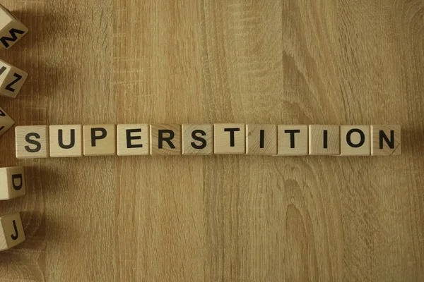 Superstition Word Wooden Blocks Desk — Stock Photo, Image