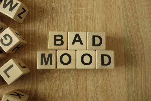 Bad mood text from wooden blocks on desk