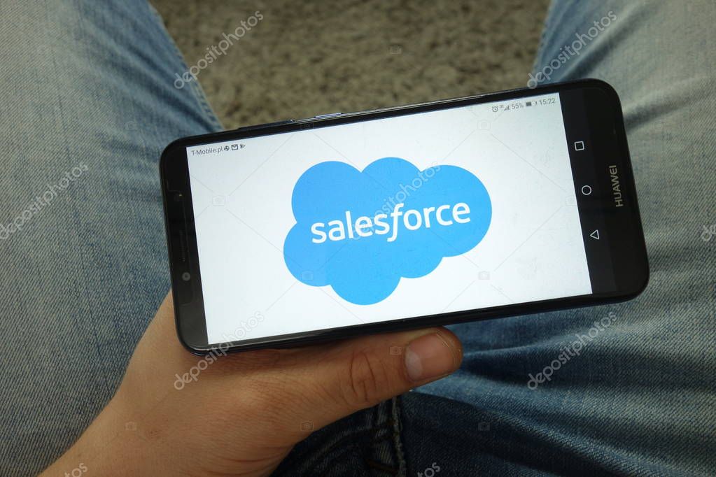 KONSKIE, POLAND - April 13, 2019: Man holding smartphone with Salesforce.com, Inc. logo