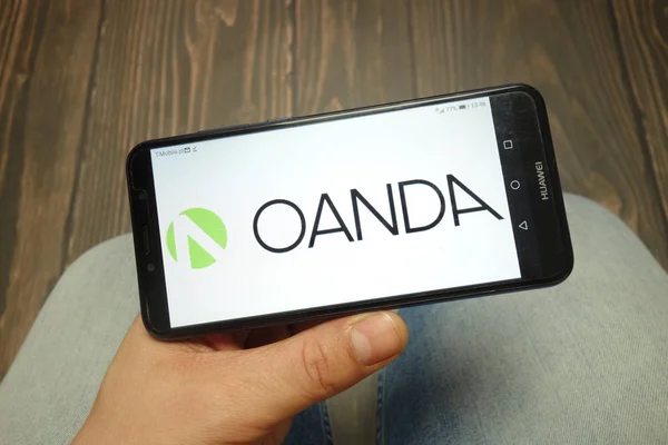 KONSKIE, POLAND - 05 MAY, 2019: Oanda logo displayed on smartphone — Stock Photo, Image