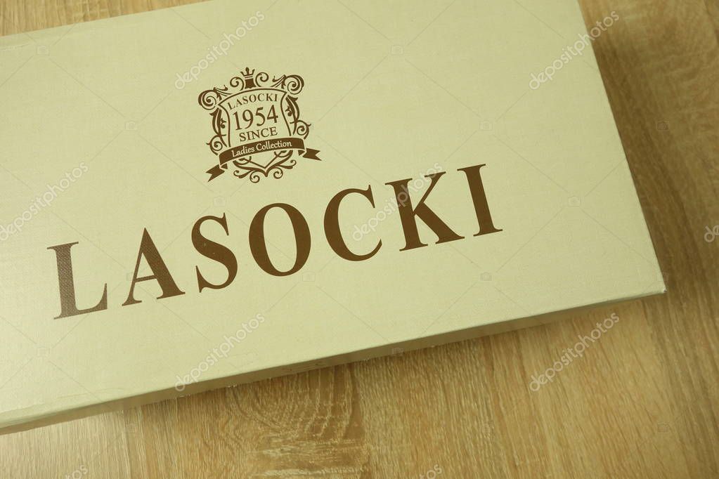 KONSKIE, POLAND - June 21, 2019: Lasocki shoes in packaging on wood