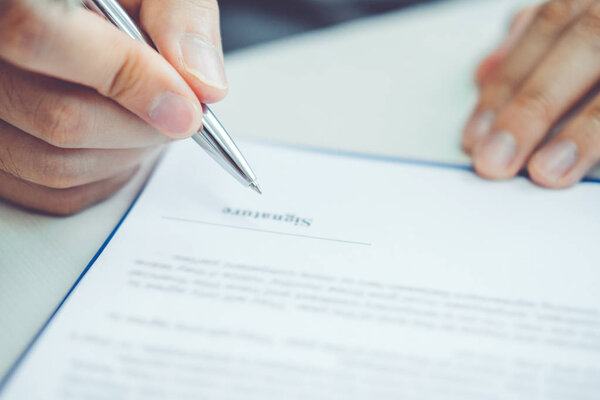 Sale agent and customer sign agreement contract, Insurance Home concept