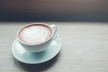 Ahşap vintage üzerinde kahve fincanı