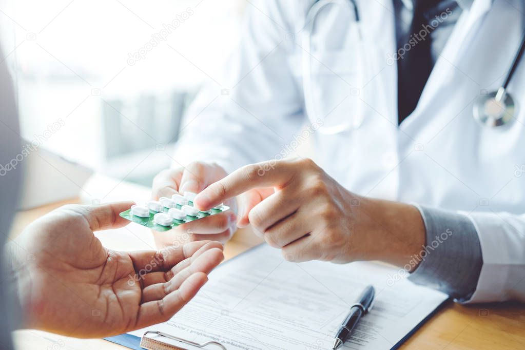 Doctor or physician recommend pills medical prescription to male