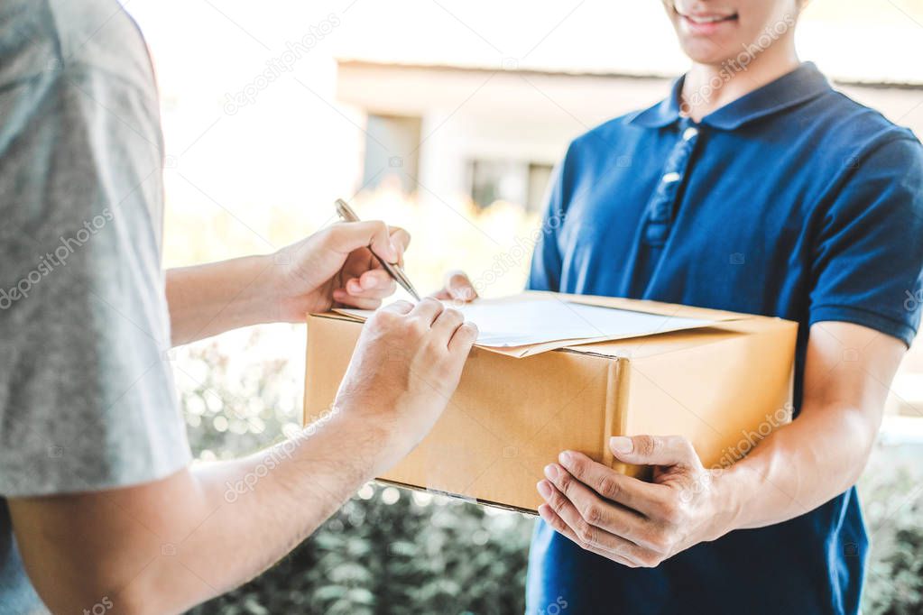 Customer Man signature in clipboard to receive package from prof