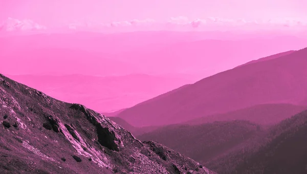 Beautiful mystic mountains sunset landscape. Mystical alpine morning, sunrise in violet and pink colors.