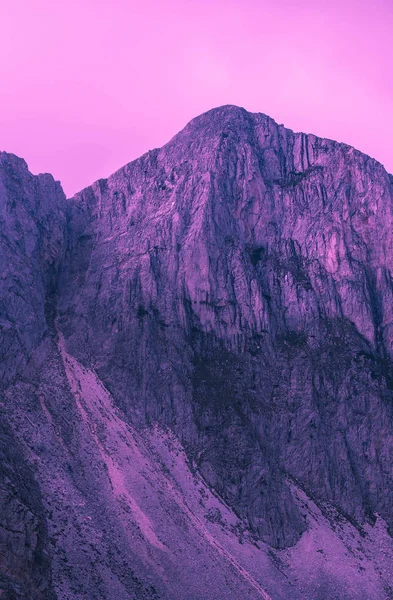 Beautiful mystic mountains sunset landscape. Mystical alpine morning, sunrise in violet and pink colors.