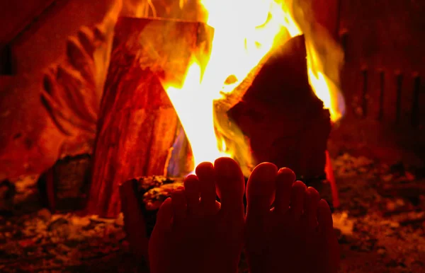 Burning Wood Fireplace Female Legs Warming Firewood Bricks Fire Woman — Stock Photo, Image