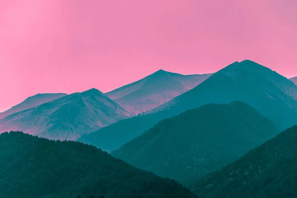 Beautiful mystic mountains sunset landscape. Mystical alpine morning, sunrise in violet and pink colors.