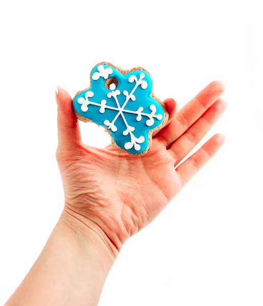 Mão Feminina Segurando Biscoito Natal Forma Floco Neve Azul Com — Fotografia de Stock