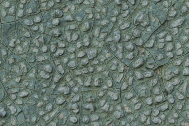 Makro fotoğraf. Eski bir mavi boya doku. Birkaç kat. Evin beton duvar yağmur tarafından yıkandı. Farklı siteler için iyi bir arka plan.