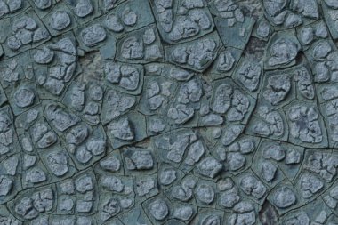 Makro fotoğraf. Eski bir mavi boya doku. Birkaç kat. Evin beton duvar yağmur tarafından yıkandı. Farklı siteler için iyi bir arka plan.