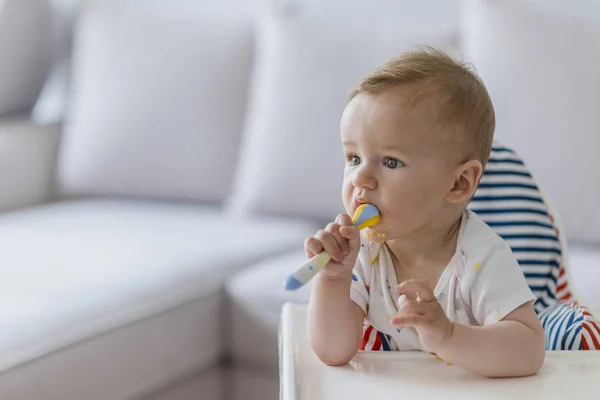 Cheerful Baby Child Eats Food Itself Spoon Happy Baby Eating — Stock Photo, Image