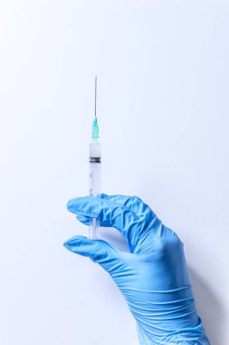 Tıbbi sağlık. Şırınga, enjeksiyon hastanede doktor. Profesyonel tıp sağlık kliniği uygulayıcısı. İğne ile ilaç plastik aşı malzemeleri.