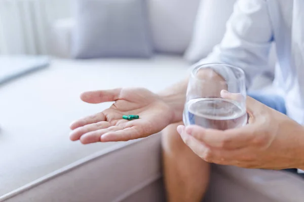 Pill Her Hand Cropped Picture Young Man Holding Glass Water — Stock Photo, Image