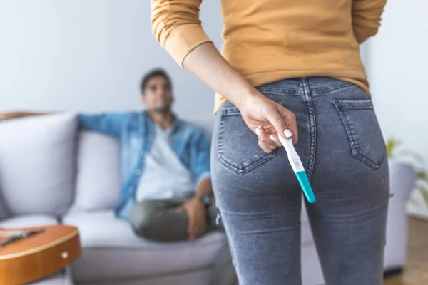 Close Woman Hiding Pregnancy Test Man — Stock Photo, Image