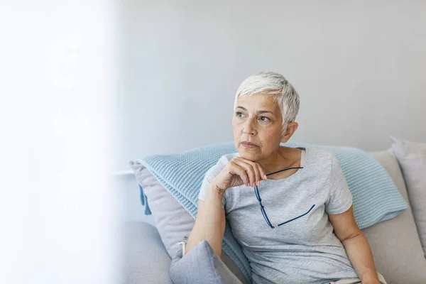 Mature Grey Haired Woman Sitting Sofa Posing Home — Stock Photo, Image