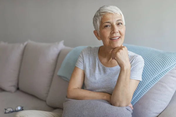 Happy Mature Woman Sitting Posing Couch — Stock Photo, Image