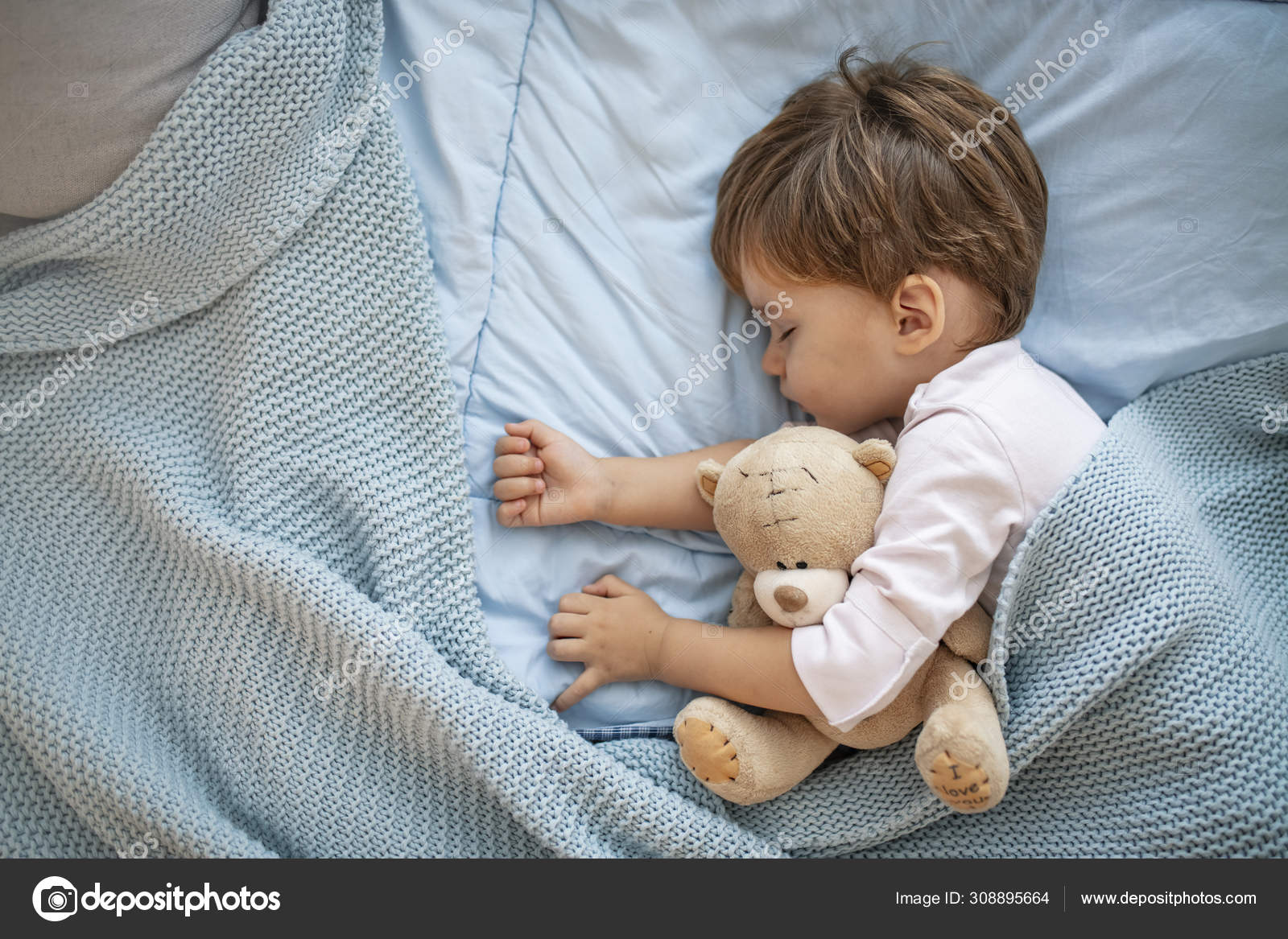 Cute Little Boy Sleeping Bed Home Sleeping Baby Bed Holding Stock ...