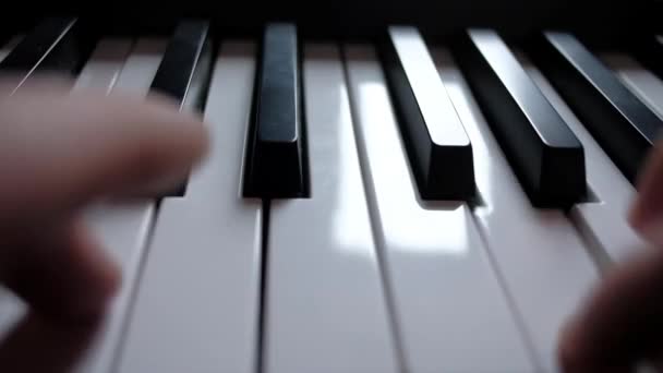 Musician plays a MIDI keyboard — Stock Video