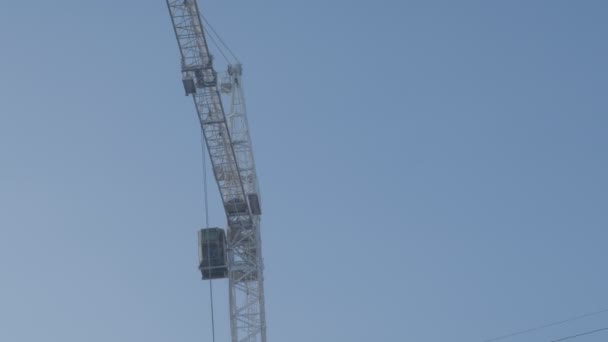 Construction crane works in the winter — Stock Video