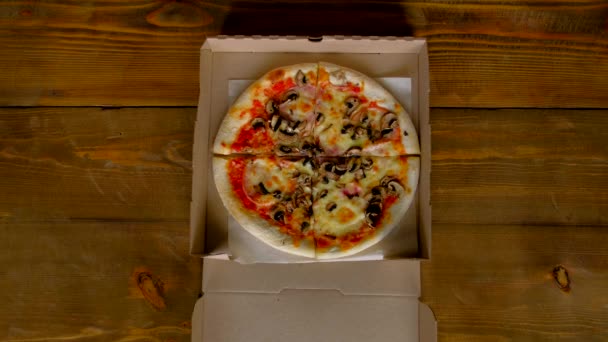 Top view - female hands with colorful manicure takes a slice of pizza. — Stock Video