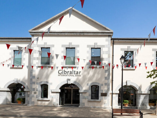 Main entrance and modern facade of Gibraltar International Bank, located in the heart of Gibraltars financial district.