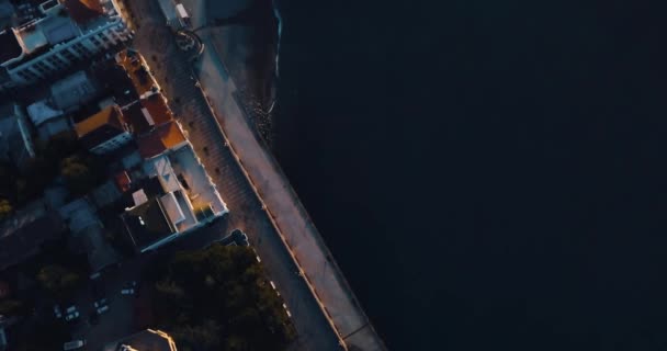 Port for ships in the city by the sea. Aerial establisher. 4k drone flight. Film vintage colors. top view. — Stock Video