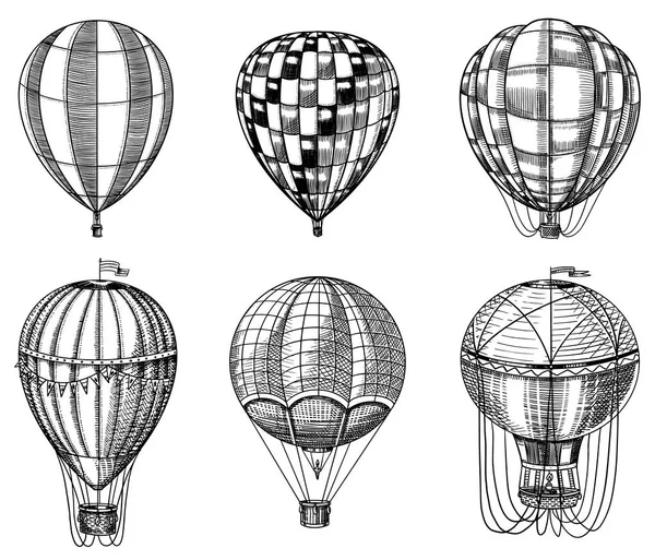 Készlet hőlégballonok. Vektoros retro repülő léghajók dekoratív elemekkel. Template szállítás romantikus logót. Kézzel rajzolt gravírozott Vintage vázlat. — Stock Vector