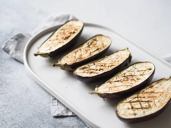 Baked Eggplants Slices Salt Spices Herbs Oval White Ceramic Plate — Stock Photo, Image