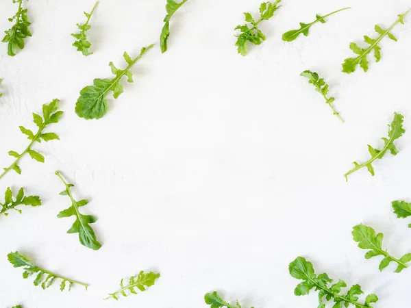 Arugula Mönster Isolerad Vit Bakgrund Sammansättning Ruccolablad Platt Ligg Ovanifrån — Stockfoto