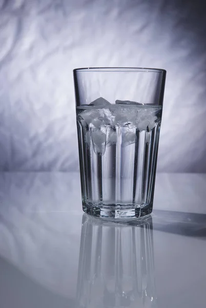 water glass with some ice