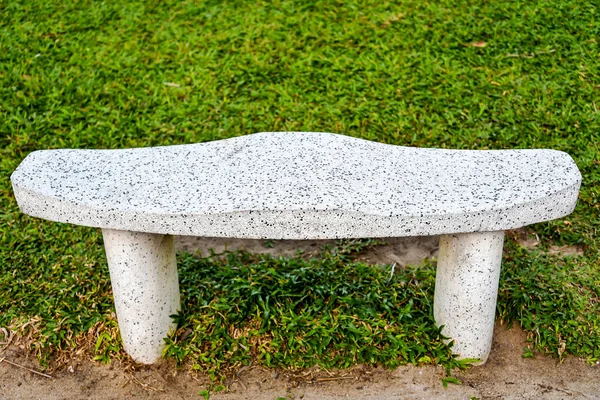 Park bench made of concrete.