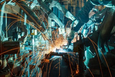 Ekip kaynak robotları otomotiv parçaları endüstrisindeki hareketi temsil ediyor