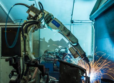 Kaynak robotları hareket temsil eder. Otomotiv sektöründe.