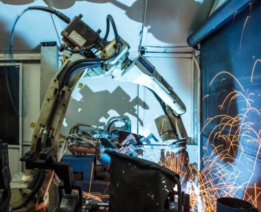 Kaynak robotları hareket temsil eder. Otomotiv sektöründe.