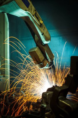 Kaynak robotları hareket temsil eder. Otomotiv sektöründe.