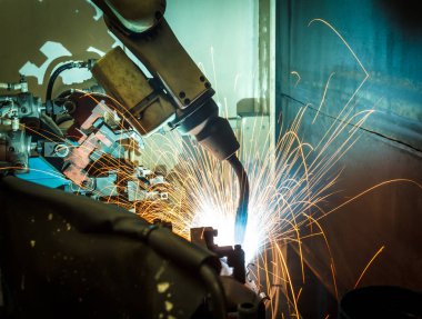 Kaynak robotları hareket temsil eder. Otomotiv sektöründe.