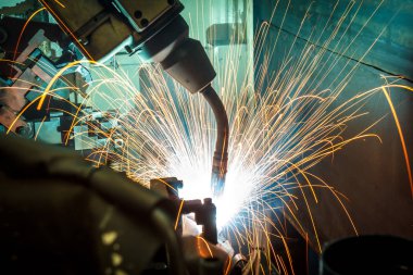 Kaynak robotları hareket temsil eder. Otomotiv sektöründe.