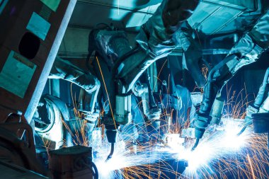 Ekip kaynak robotları otomotiv parçaları endüstrisindeki hareketi temsil ediyor