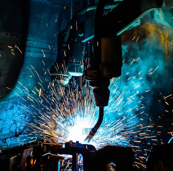 Welding robots movement in a car factory