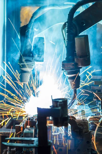 Welding robots movement auto parts in a car factory