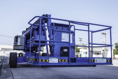 Boom Asansör bir inşaat sitesinde Teleskopik kol.