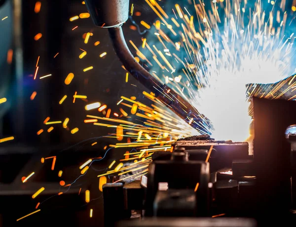 Welding robots movement in a car factory