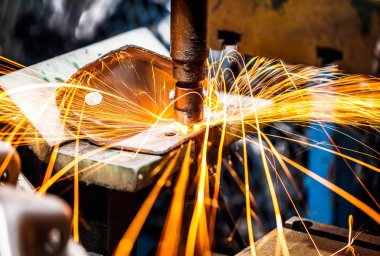 Spot machine is welding nut to automotive par