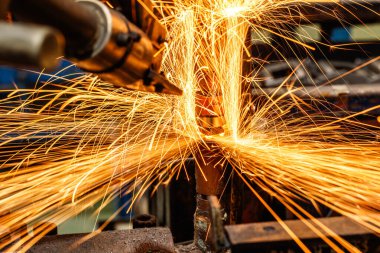 Spot machine is welding nut to automotive par