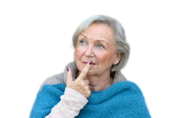 Задумчивая Стильная Пожилая Женщина Смотрит Воздух Пальцем Губы Созерцательным Выражением — стоковое фото