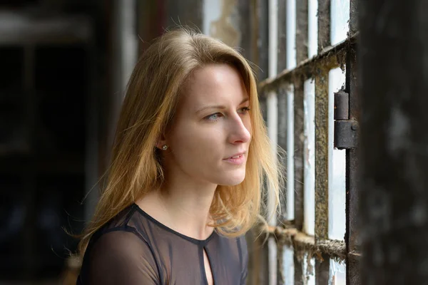 Attractive Young Blond Student Looking Out Window Serious Thoughtful Expression — Stock Photo, Image